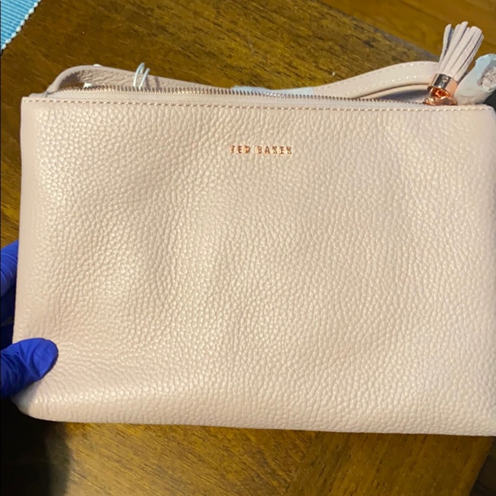 - Pink/peach Ted Baker